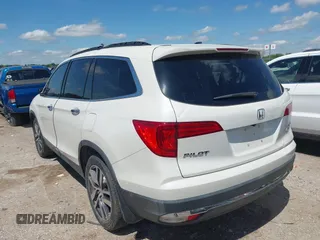 2017 Honda Pilot Touring with VIN 5FNYF6H92HB054145, listed as a IAAI auction lot 42200391 with 70,096 mi miles and . Bid and sale history available at DreamBid. Image 3.