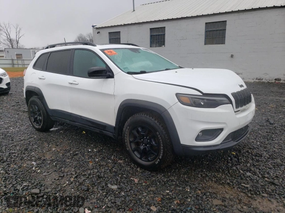2022 Jeep Cherokee X with VIN 1C4PJMCX9ND527482, listed as a Copart auction lot 85089294 with 33,015 mi miles and Salvage Title. Bid and sale history available at carsss.com. Image 4.