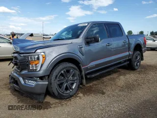 2023 Ford F-150 XL with VIN 1FTFW1ED5PFC32174, listed as a Copart auction lot 62916995 with 25,284 mi miles and Salvage title. Bid and sale history available at DreamBid. Image 1.