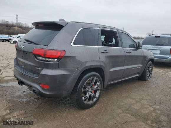 2015 Jeep Grand Cherokee SRT with VIN 1C4RJFDJ8FC752210, listed as a Copart auction lot 45694094 with 76,721 mi miles and Salvage Title. Bid and sale history available at carsss.com. Image 3.