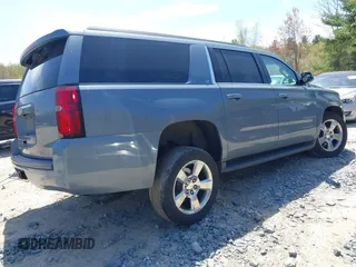 2016 Chevrolet Suburban LT z VIN 1GNSKHKC4GR427591, wystawiony jako IAAI lot #42162723 z przebiegiem 131 771 mil mil oraz . Historia ofert i sprzedaży dostępna na DreamBid. Obrazek 4.