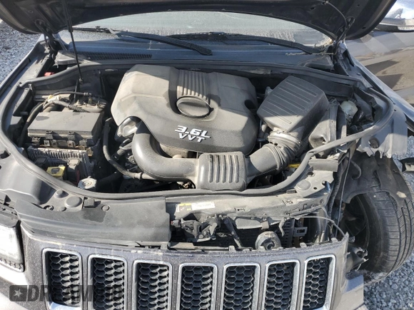 2014 Jeep Grand Cherokee Overland with VIN 1C4RJFCG4EC172361, listed as a Copart auction lot 49053155 with 144,916 mi miles and Salvage Title. Bid and sale history available at DreamBid. Image 12.