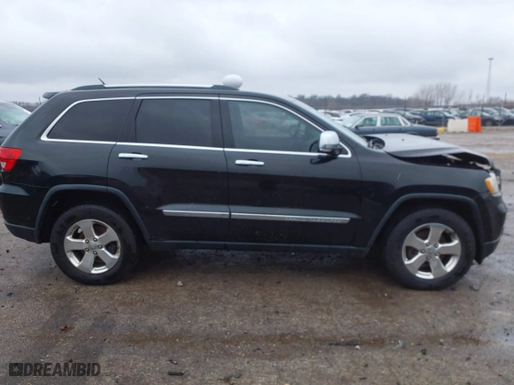 2013 Jeep Grand Cherokee Limited with VIN 1C4RJFBG4DC633137, listed as a IAAI auction lot 41235064 with 163,820 mi miles. Bid and sale history available at carsss.com. Image 14.