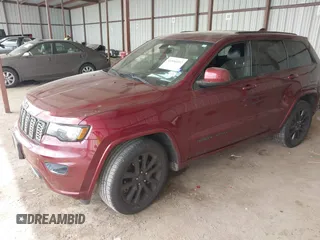 2017 Jeep Grand Cherokee Laredo with VIN 1C4RJEAG3HC823139, listed as a IAAI auction lot 41886032 with 97,224 mi miles and . Bid and sale history available at DreamBid. Image 2.