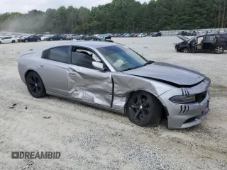 2016 Dodge Charger R/T with VIN 2C3CDXCTXGH222331, listed as a Copart auction lot 59428915 with 120,691 mi miles and Salvage title. Bid and sale history available at DreamBid. Image 4.