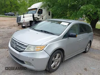 2012 Honda Odyssey Touring with VIN 5FNRL5H95CB101605, listed as a IAAI auction lot 42025163 with 286,421 mi miles. Bid and sale history available at carsss.com. Image 2.