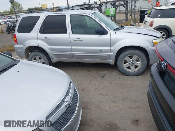 2005 Ford Escape Hybrid with VIN 1FMCU95H05KC95225, listed as a IAAI auction lot 41798610 with 216,659 mi miles and . Bid and sale history available at DreamBid. Image 13.