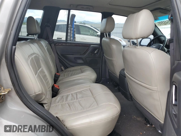 2001 Jeep Grand Cherokee Limited with VIN 1J4GW58N91C653866, listed as a Copart auction lot 58546895 with 159,661 mi miles and Salvage title. Bid and sale history available at DreamBid. Image 11.