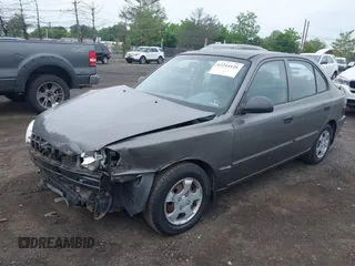 2002 Hyundai Accent GL z VIN KMHCG45C52U372587, wystawiony jako IAAI lot #42244428 z przebiegiem 43 538 mil mil oraz . Historia ofert i sprzedaży dostępna na DreamBid. Obrazek 2.