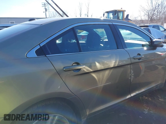 2013 Ford Taurus SEL with VIN 1FAHP2H82DG202314, listed as a IAAI auction lot 41673470 with 273,627 mi miles and . Bid and sale history available at DreamBid. Image 13.