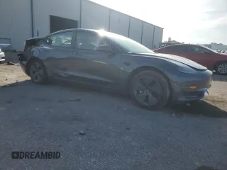 2023 Tesla Model 3 z VIN 5YJ3E1EA6PF621759, wystawiony jako Copart lot #63669045 z przebiegiem 20 094 mil mil oraz Szkoda całkowita • Salvage title. Historia ofert i sprzedaży dostępna na DreamBid. Obrazek 4.