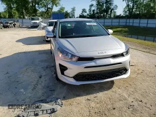 2023 Kia Rio S z VIN 3KPA24AD6PE582792, wystawiony jako Copart lot #54966245 z przebiegiem 3373 mil mil oraz Nie do naprawy • Non repairable. Historia ofert i sprzedaży dostępna na DreamBid. Obrazek 13.
