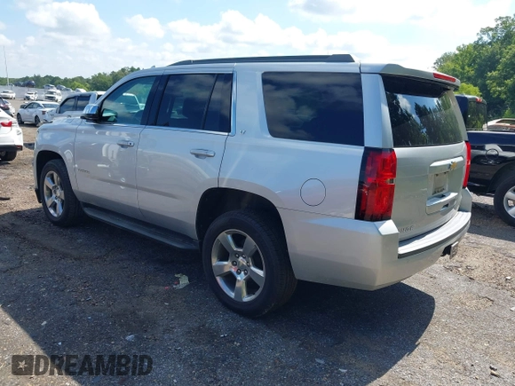 2017 Chevrolet Tahoe LT with VIN 1GNSCBKC6HR400761, listed as a IAAI auction lot 42612368 with 125,843 mi miles and . Bid and sale history available at DreamBid. Image 3.