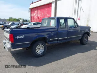 1994 Ford F-150 with VIN 1FTEX14N5RKA40427, listed as a IAAI auction lot 42100522 with 202,585 mi miles. Bid and sale history available at carsss.com. Image 4.