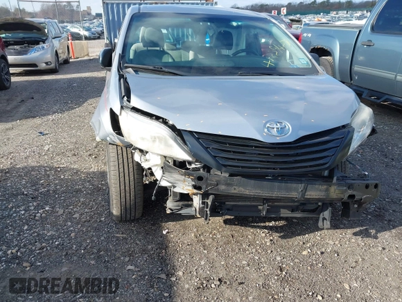 2015 Toyota Sienna L with VIN 5TDZK3DCXFS596277, listed as a IAAI auction lot 41229427 with 108,900 mi miles and . Bid and sale history available at DreamBid. Image 6.