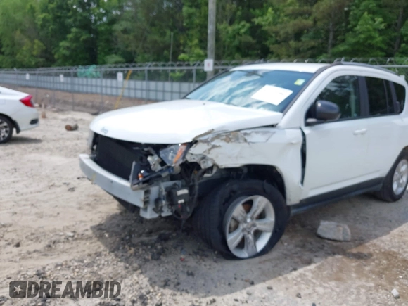 2016 Jeep Compass Sport with VIN 1C4NJCBA0GD742797, listed as a IAAI auction lot 42177186 with 128,665 mi miles and . Bid and sale history available at DreamBid. Image 6.