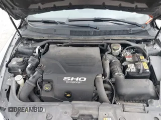 2014 Ford Taurus SHO with VIN 1FAHP2KTXEG160800, listed as a IAAI auction lot 42083237 with 75,048 mi miles. Bid and sale history available at carsss.com. Image 10.