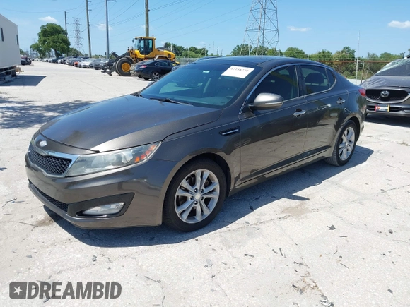 2013 Kia Optima EX with VIN 5XXGN4A78DG220462, listed as a IAAI auction lot 42158221 with 152,637 mi miles and . Bid and sale history available at DreamBid. Image 2.