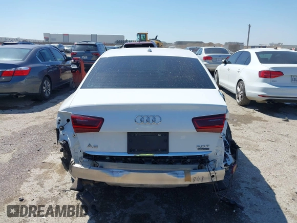 2016 Audi A6 2.0T Premium Plus with VIN WAUGFAFC4GN045229, listed as a IAAI auction lot 41974532 with 122,585 mi miles. Bid and sale history available at carsss.com. Image 16.