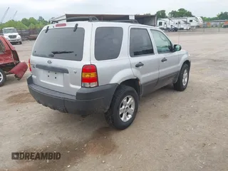 2006 Ford Escape XLT z VIN 1FMYU03136KA68913, wystawiony jako IAAI lot #42265822 z przebiegiem 129 401 mil mil oraz . Historia ofert i sprzedaży dostępna na DreamBid. Obrazek 4.