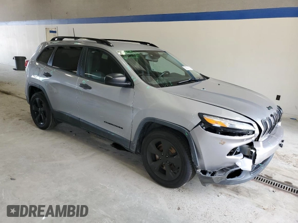 2017 Jeep Cherokee Altitude with VIN 1C4PJLABXHW586048, listed as a Copart auction lot 62674745 with 106,334 mi miles and Salvage title. Bid and sale history available at DreamBid. Image 4.