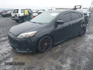 2014 Ford Focus ST with VIN 1FADP3L91EL441379, listed as a IAAI auction lot 41092598 with 58,670 mi miles and . Bid and sale history available at carsss.com. Image 17.
