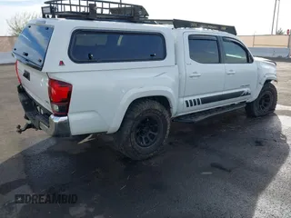2019 Toyota Tacoma SR z VIN 3TMCZ5AN6KM284101, wystawiony jako IAAI lot #41099466 z przebiegiem 36 119 mil mil oraz . Historia ofert i sprzedaży dostępna na DreamBid. Obrazek 4.