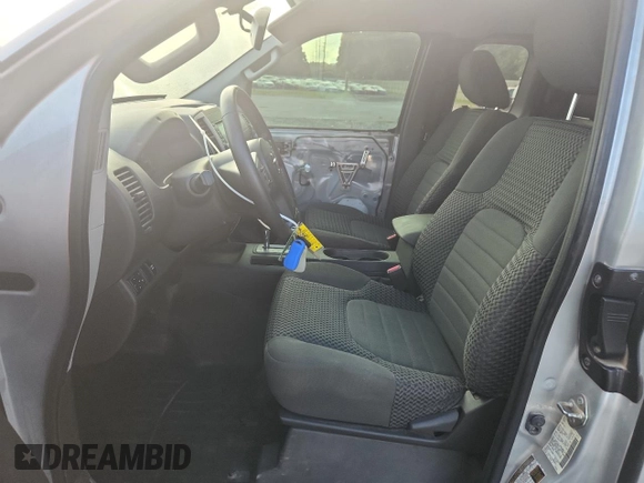 2017 Nissan Frontier SV with VIN 1N6DD0CU8HN732702, listed as a Copart auction lot 60321505 with 111,699 mi miles and Salvage title. Bid and sale history available at DreamBid. Image 7.