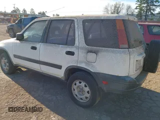 1999 Honda CR-V LX with VIN JHLRD284XXC020668, listed as a IAAI auction lot 41842024 with 224,359 mi miles. Bid and sale history available at carsss.com. Image 3.