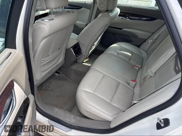 2013 Cadillac XTS Platinum z VIN 2G61V5S33D9173441, wystawiony jako IAAI lot #41902672 z przebiegiem 103 044 mil mil oraz . Historia ofert i sprzedaży dostępna na DreamBid. Obrazek 8.
