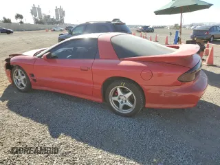 2001 Pontiac Firebird Formula z VIN 2G2FV22G112117625, wystawiony jako Copart lot #81836394 z przebiegiem 142 503 mil mil oraz Szkoda całkowita • Salvage title. Historia ofert i sprzedaży dostępna na DreamBid. Obrazek 2.
