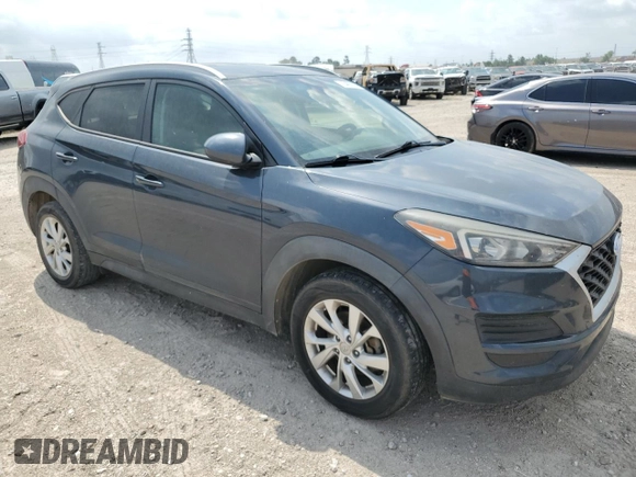 2019 Hyundai Tucson Value z VIN KM8J33A40KU914285, wystawiony jako Copart lot #54839375 z przebiegiem 81 214 mil mil oraz Szkoda całkowita • Salvage title. Historia ofert i sprzedaży dostępna na DreamBid. Obrazek 4.