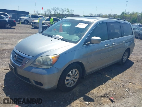 2010 Honda Odyssey EX-L with VIN 5FNRL3H62AB001954, listed as a IAAI auction lot 42028959 with 142,743 mi miles. Bid and sale history available at carsss.com. Image 2.