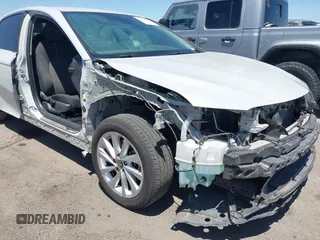 2023 Toyota Camry LE z VIN 4T1C11AK3PU182386, wystawiony jako IAAI lot #42118553 z przebiegiem 38 705 mil mil oraz . Historia ofert i sprzedaży dostępna na DreamBid. Obrazek 6.