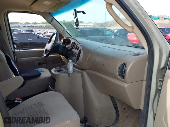2005 Ford Econoline Passenger XL with VIN 1FMRE11W15HA64778, listed as a IAAI auction lot 42397426 with 330,632 mi miles and . Bid and sale history available at DreamBid. Image 5.