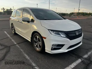 2019 Honda Odyssey Touring with VIN 5FNRL6H86KB053432, listed as a Copart auction lot 65482425 with 87,470 mi miles and Salvage title. Bid and sale history available at DreamBid. Image 1.
