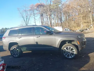 2021 Jeep Grand Cherokee L Overland with VIN 1C4RJKDT4M8156604, listed as a IAAI auction lot 41090934 with 40,070 mi miles. Bid and sale history available at carsss.com. Image 13.