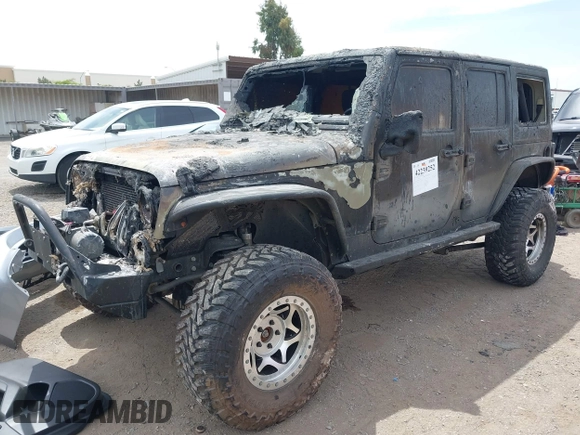 2016 Jeep Wrangler Unlimited Sahara z VIN 1C4HJWEG4GL261147, wystawiony jako IAAI lot #42239252 z przebiegiem 69 604 mil mil oraz . Historia ofert i sprzedaży dostępna na DreamBid. Obrazek 2.