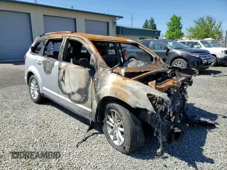 2014 Dodge Journey SXT z VIN 3C4PDDBG3ET178595, wystawiony jako Copart lot #56893275 z przebiegiem Nie podano mil oraz Szkoda całkowita • Salvage title. Historia ofert i sprzedaży dostępna na DreamBid. Obrazek 13.