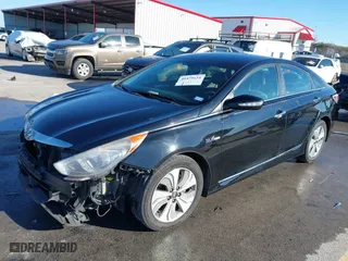 2013 Hyundai Sonata Hybrid Limited with VIN KMHEC4A40DA090333, listed as a IAAI auction lot 41479624 with 164,745 mi miles. Bid and sale history available at carsss.com. Image 2.