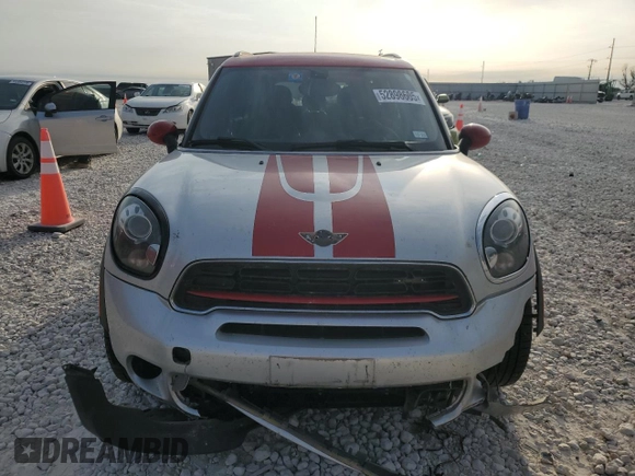 2016 MINI Countryman John Cooper Works with VIN WMWXD1C59GWT97602, listed as a Copart auction lot 52898605 with 141,749 mi miles and Salvage Title. Bid and sale history available at DreamBid. Image 5.