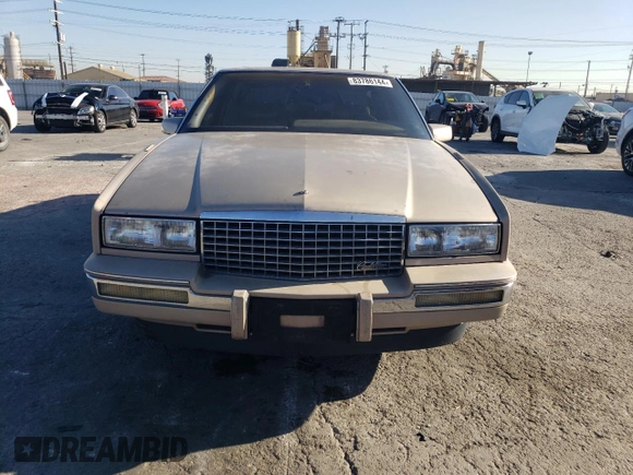1988 Cadillac Eldorado with VIN 1G6EL1153JU612185, listed as a Copart auction lot 83786144 with 133,882 mi miles and Salvage Title. Bid and sale history available at DreamBid. Image 5.