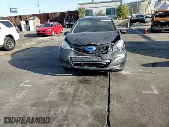 2012 Toyota Yaris L z VIN JTDKTUD33CD541021, wystawiony jako Copart lot #49515845 z przebiegiem 69 122 mil mil oraz Szkoda całkowita • Salvage title. Historia ofert i sprzedaży dostępna na DreamBid. Obrazek 11.
