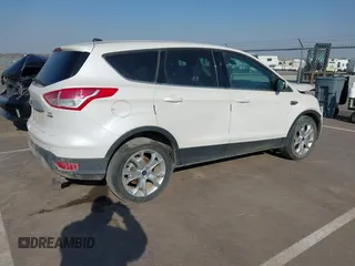 2013 Ford Escape SEL with VIN 1FMCU9H97DUD25280, listed as a IAAI auction lot 41880958 with 132,003 mi miles and . Bid and sale history available at DreamBid. Image 4.