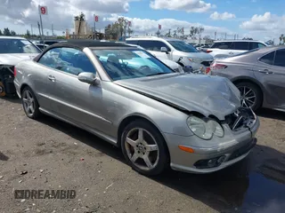 2005 Mercedes-Benz CLK 5.0L with VIN WDBTK75J45F125457, listed as a IAAI auction lot 41586377 with 115,188 mi miles. Bid and sale history available at carsss.com. Image 1.