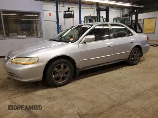 2002 Honda Accord EX z VIN 1HGCG56522A071756, wystawiony jako Copart lot #87310454 z przebiegiem 146 462 mil mil oraz Czysty tytuł • Clean title. Historia ofert i sprzedaży dostępna na DreamBid. Obrazek 1.