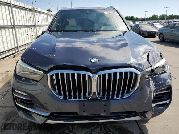 2020 BMW X5 xDrive40i with VIN 5UXCR6C06LLL75359, listed as a Copart auction lot 60897885 with 66,631 mi miles and Salvage title. Bid and sale history available at DreamBid. Image 5.