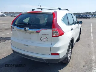 2015 Honda CR-V LX with VIN 5J6RM4H39FL032027, listed as a IAAI auction lot 42013029 with 79,210 mi miles and . Bid and sale history available at carsss.com. Image 4.