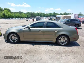 2010 Cadillac CTS Luxury with VIN 1G6DF5EG7A0110647, listed as a IAAI auction lot 42318842 with 243,152 mi miles and . Bid and sale history available at DreamBid. Image 14.