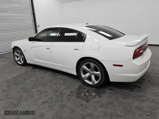 2013 Dodge Charger RT Plus with VIN 2C3CDXCT9DH716885, listed as a Copart auction lot 76330614 with 152,222 mi miles and Clean Title. Bid and sale history available at carsss.com. Image 2.